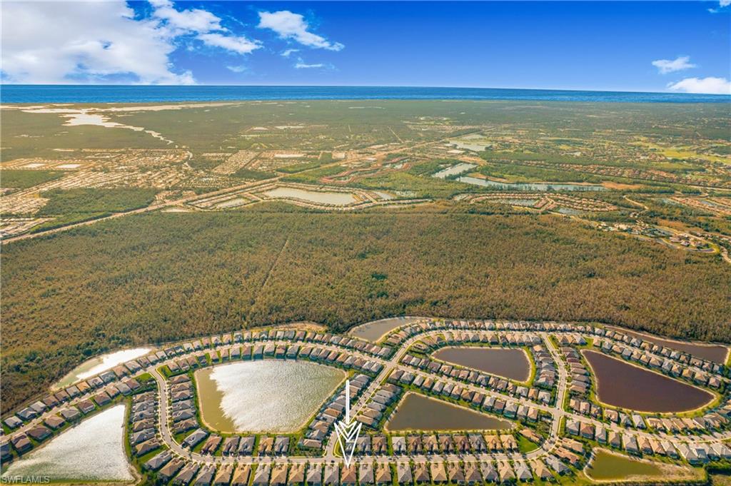 7674 Jacaranda Lane Naples, FL 34114 - Photo 31 of 45 a view of an ocean and beach