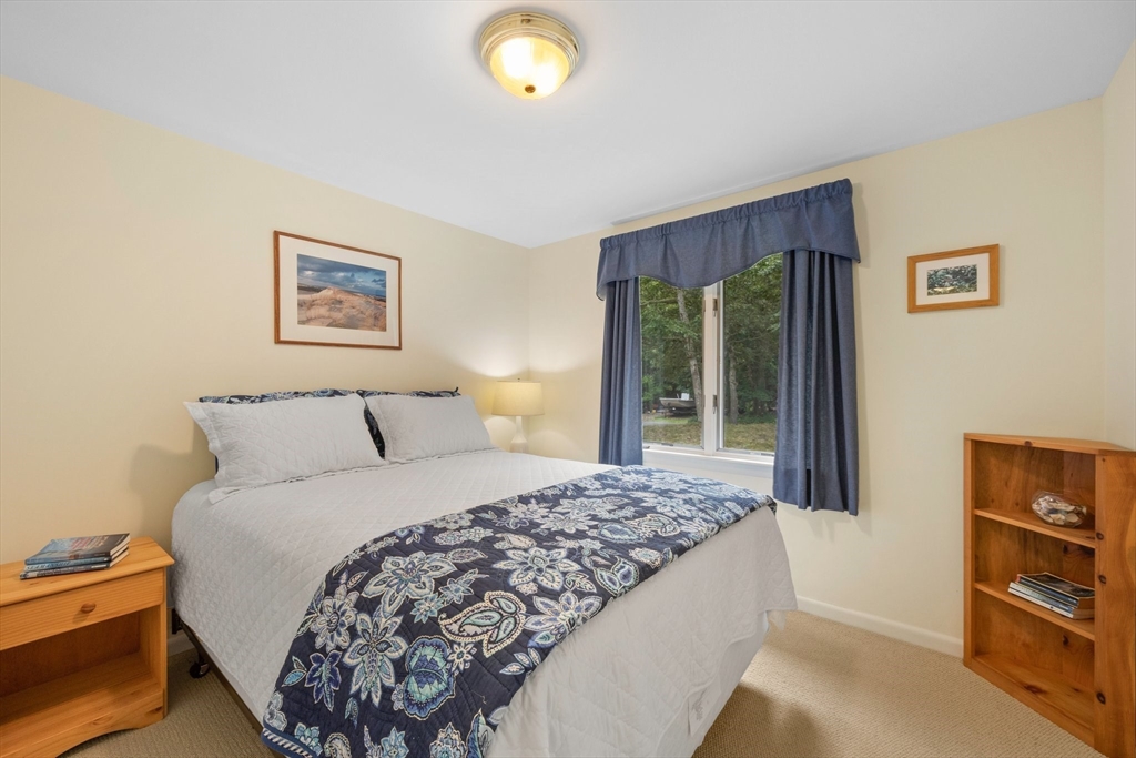 11 Oval Road Chatham, MA 02633 - Photo 13 of 35 a bedroom with a bed and a window