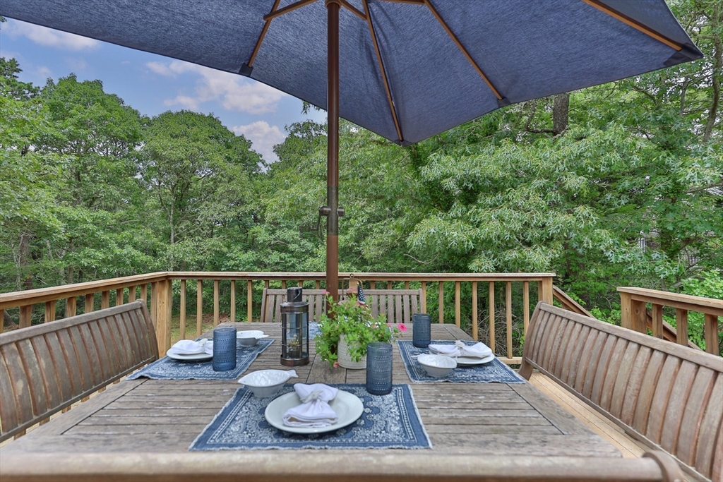 11 Oval Road Chatham, MA 02633 - Photo 17 of 35 a view of a deck in the backyard