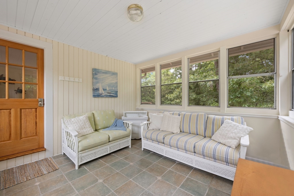 11 Oval Road Chatham, MA 02633 - Photo 18 of 35 a living room with furniture and a large window