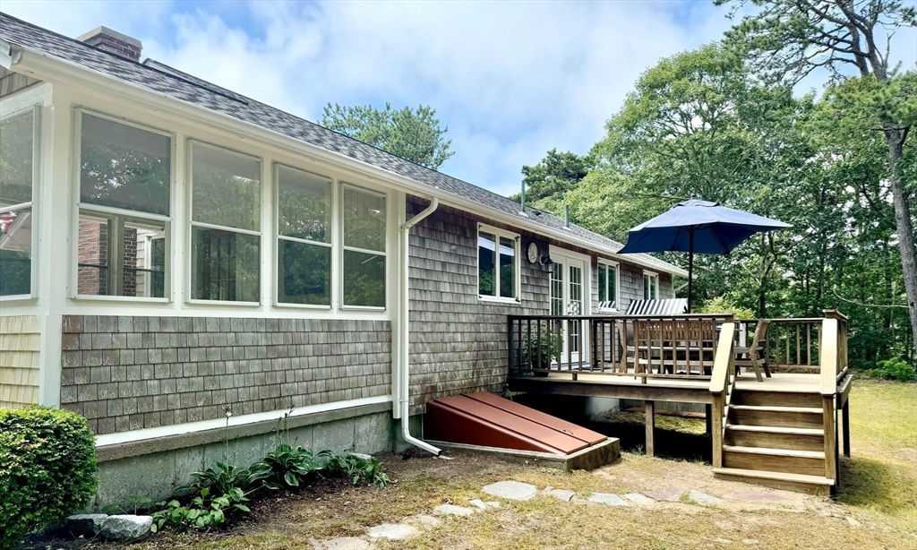 11 Oval Road Chatham, MA 02633 - Photo 23 of 35 a front view of a house with a yard