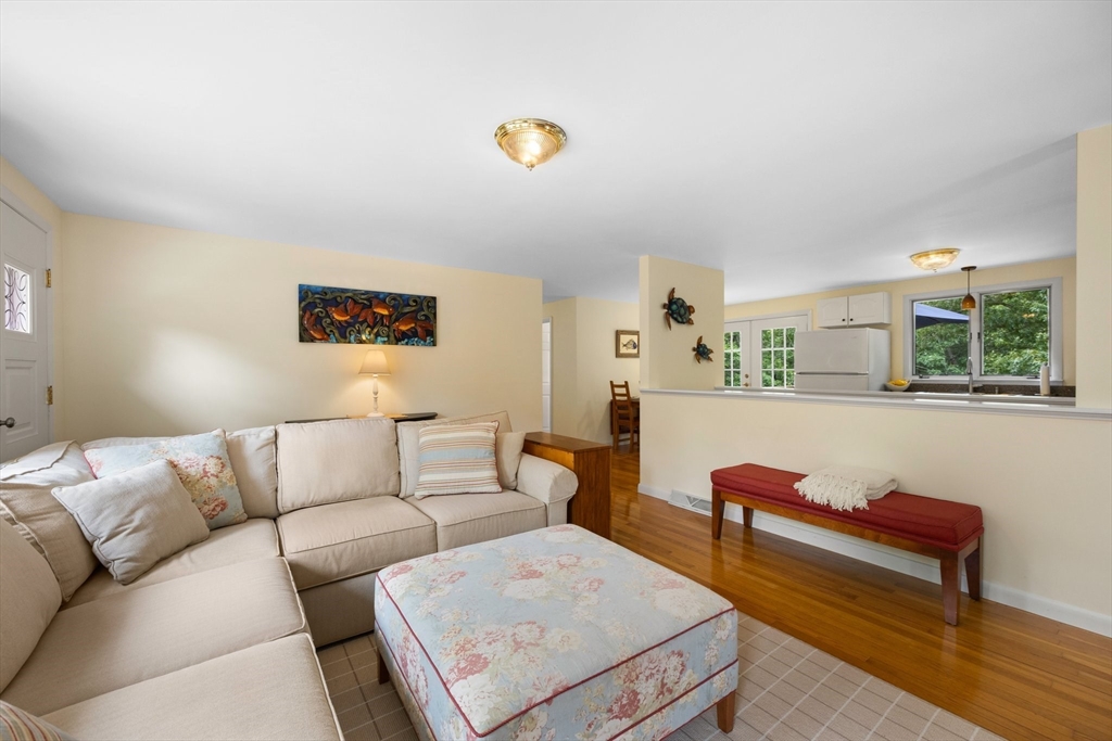 11 Oval Road Chatham, MA 02633 - Photo 6 of 35 a living room with furniture and a potted plant