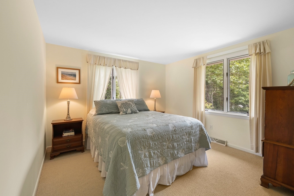 11 Oval Road Chatham, MA 02633 - Photo 10 of 35 a bedroom with a bed and a window