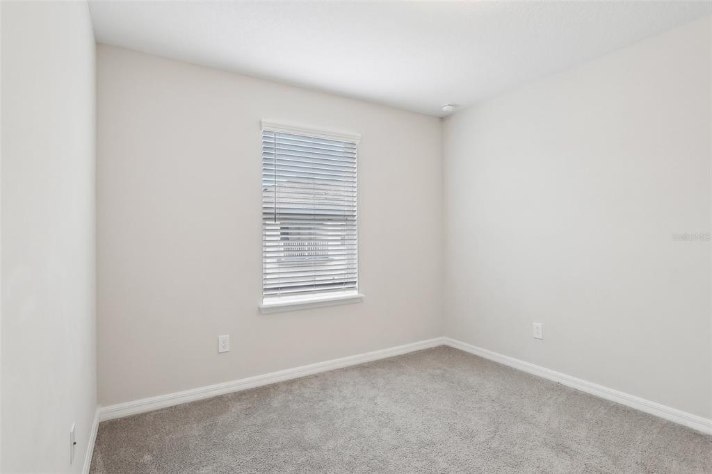 9457 Randal Park Boulevard Orlando, FL 32832 - Photo 22 of 52 an empty room with a window