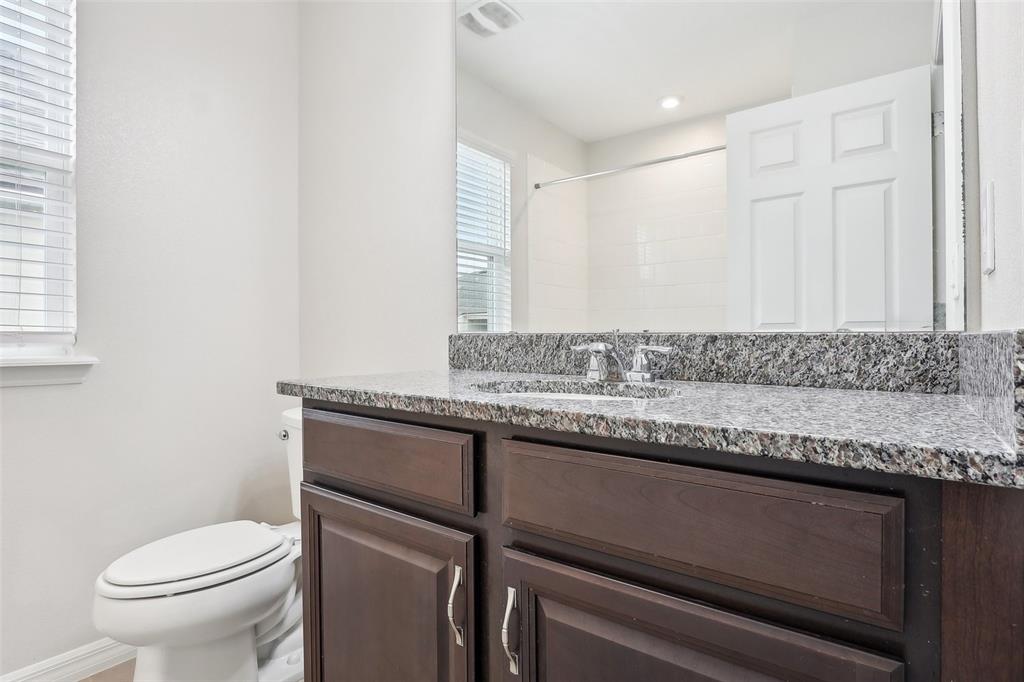 9457 Randal Park Boulevard Orlando, FL 32832 - Photo 24 of 52 a view of bathroom with a sink and a toilet