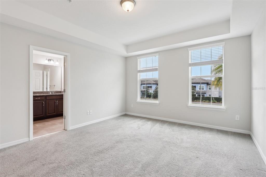 9457 Randal Park Boulevard Orlando, FL 32832 - Photo 29 of 52 a view of an empty room with a window