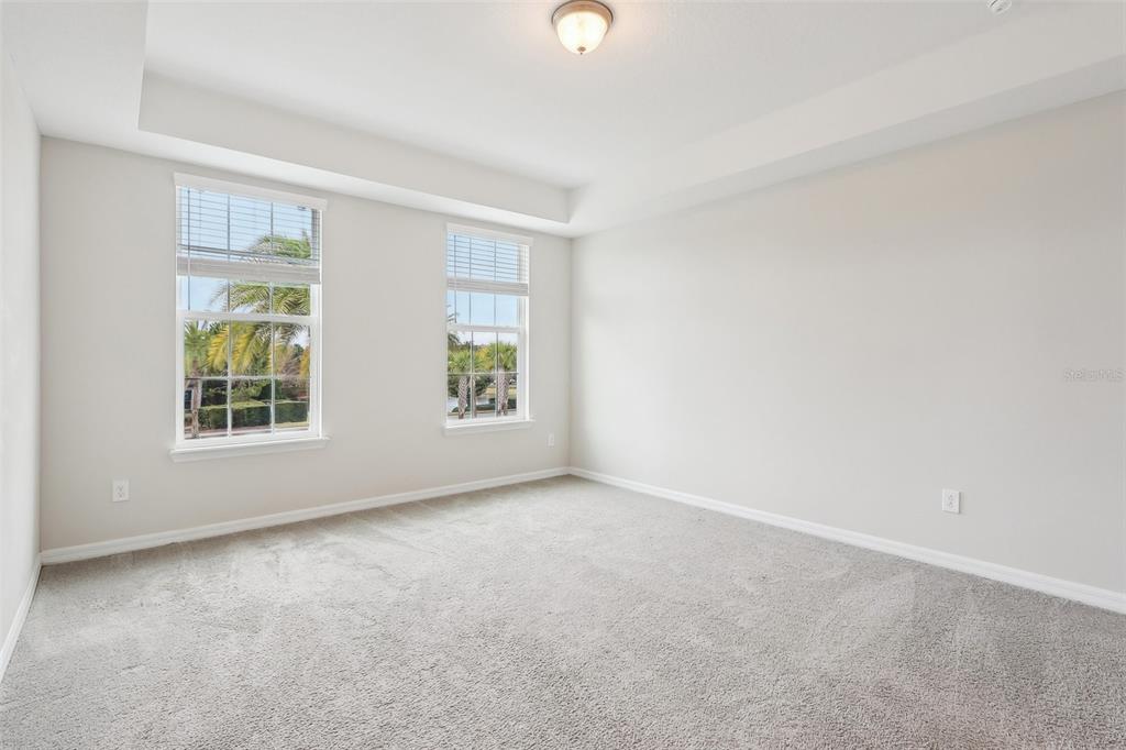 9457 Randal Park Boulevard Orlando, FL 32832 - Photo 30 of 52 an empty room with windows