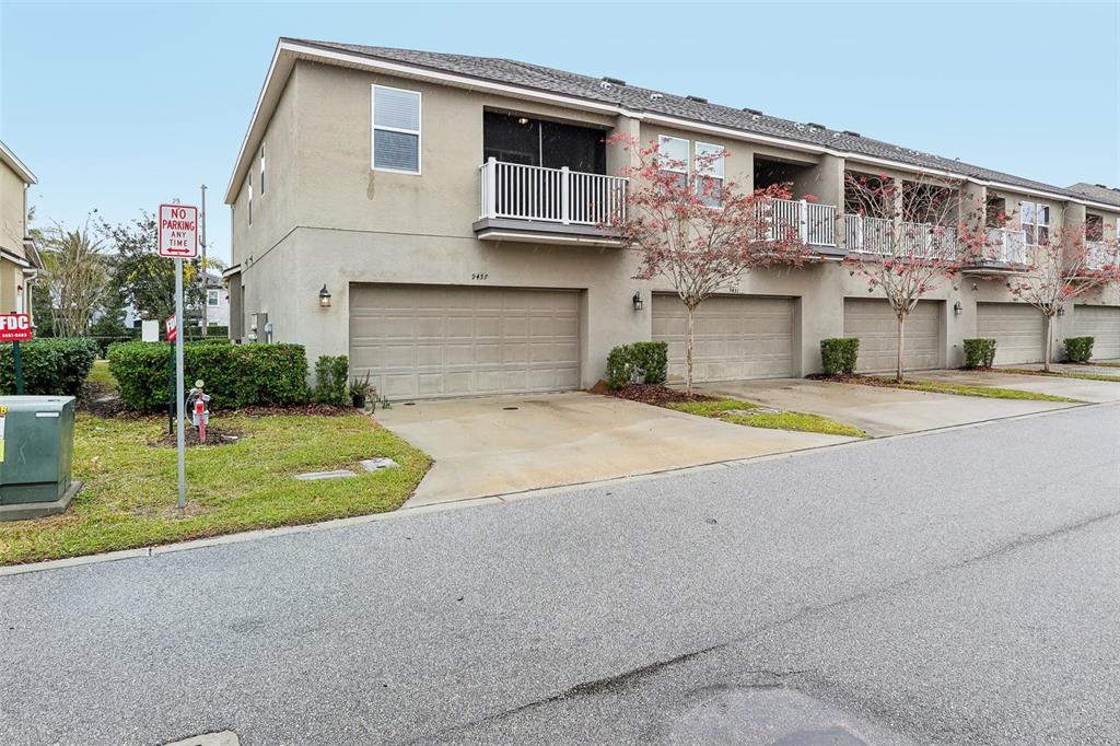 9457 Randal Park Boulevard Orlando, FL 32832 - Photo 37 of 52 a view of building with yard