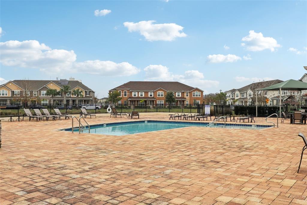 9457 Randal Park Boulevard Orlando, FL 32832 - Photo 48 of 52 a view of a swimming pool with an ocean view