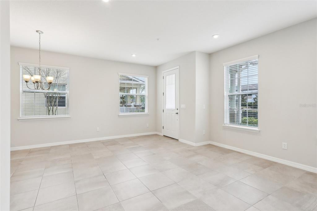 9457 Randal Park Boulevard Orlando, FL 32832 - Photo 8 of 52 a view of an empty room with a window