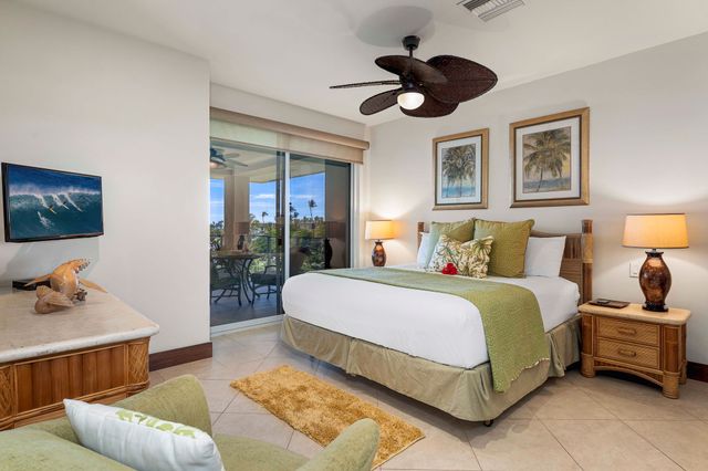 a bed room with a bed and furniture