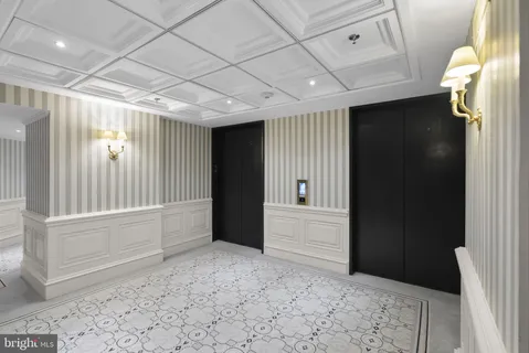 a view of entryway with a front door