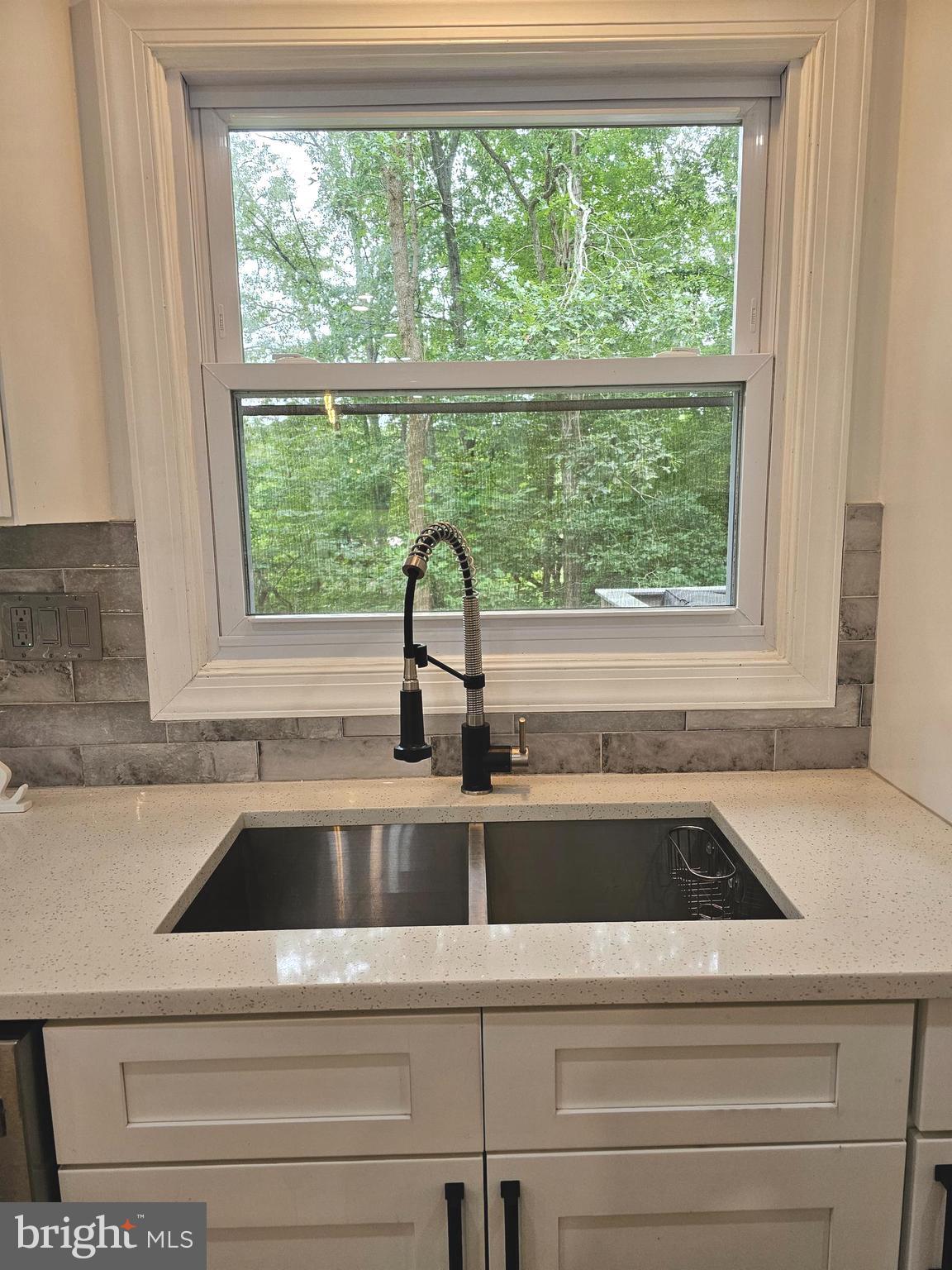 133 Meadows Road Fredericksburg, VA 22406 - Photo 13 of 55 DOUBLE SINK AND VIEW OF REAR YARD