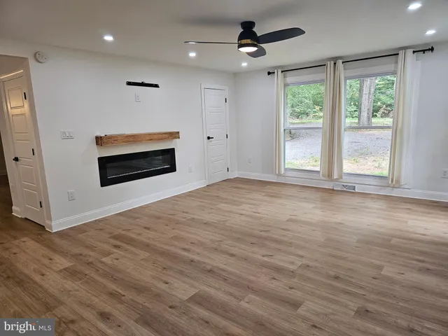 a living room with a fireplace