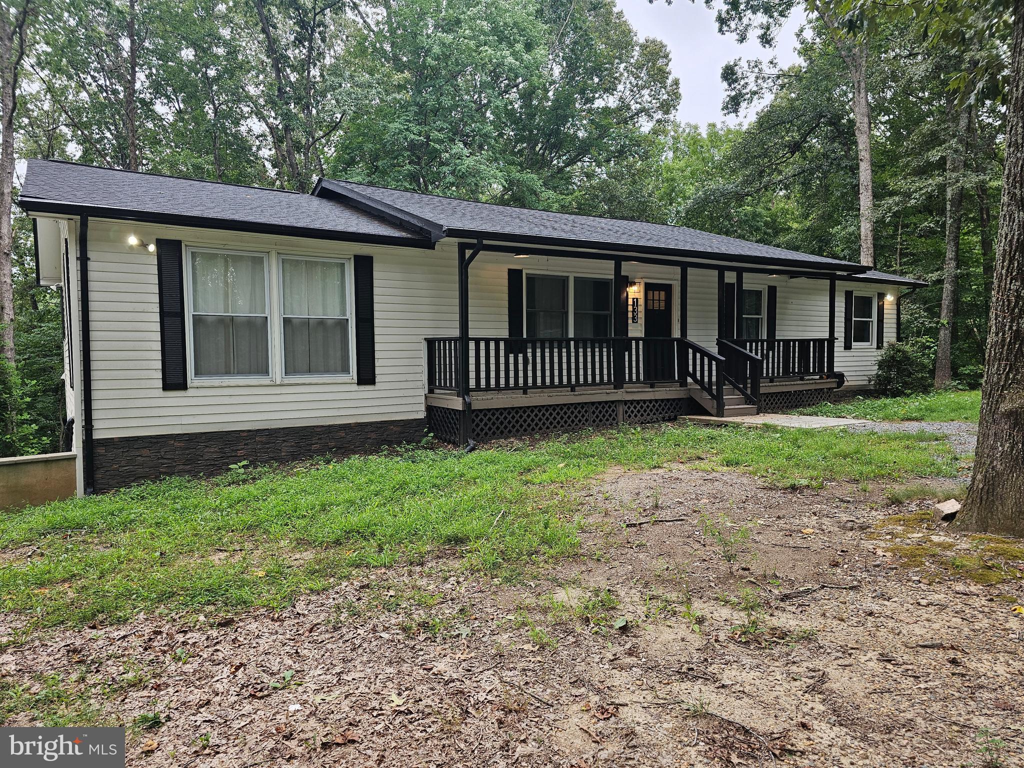 133 Meadows Road Fredericksburg, VA 22406 - Photo 3 of 55 a view of a house with a yard and sitting area