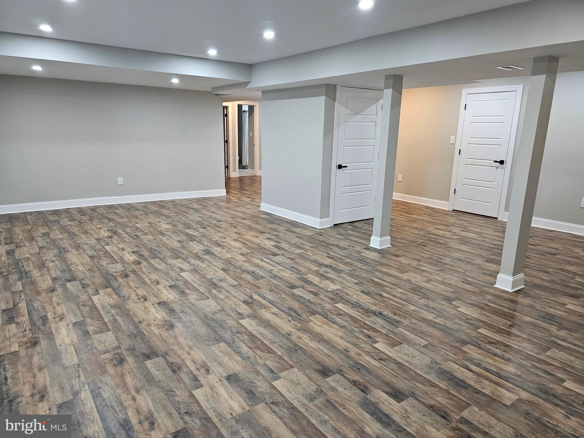 133 Meadows Road Fredericksburg, VA 22406 - Photo 33 of 55 an empty room with wooden floor and closet area