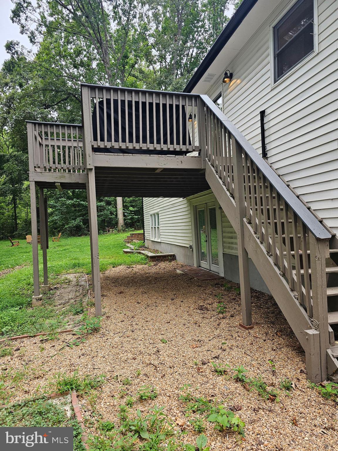133 Meadows Road Fredericksburg, VA 22406 - Photo 48 of 55 a view of a house with backyard and deck