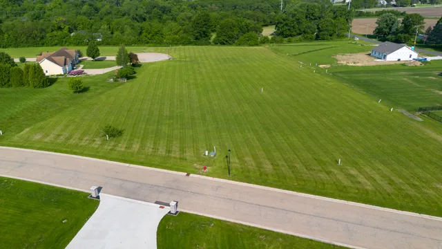 an aerial view of a house with a garden