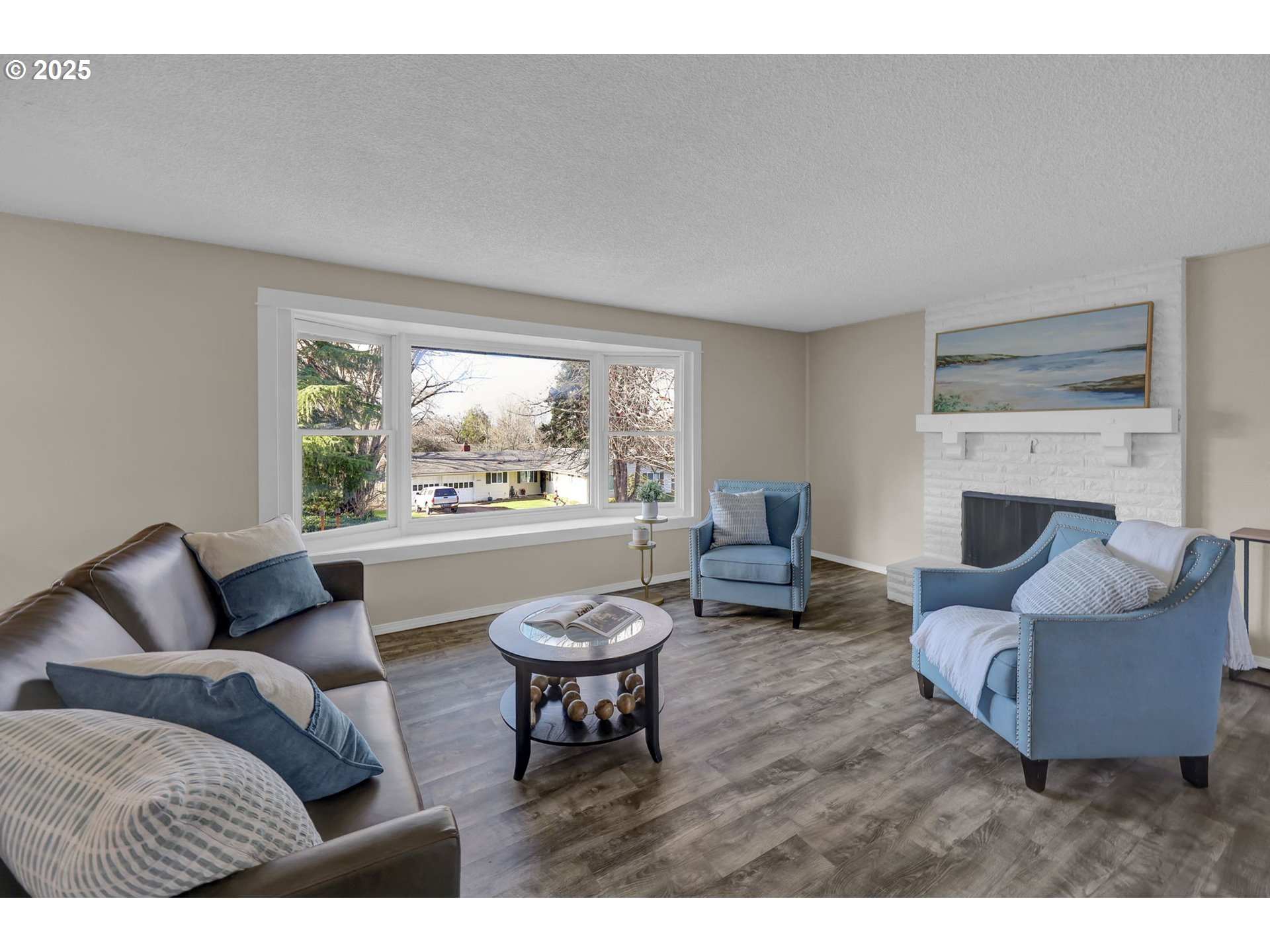 2015 Coventry Way Eugene, OR 97405 - Photo 11 of 48 a living room with furniture and a fireplace