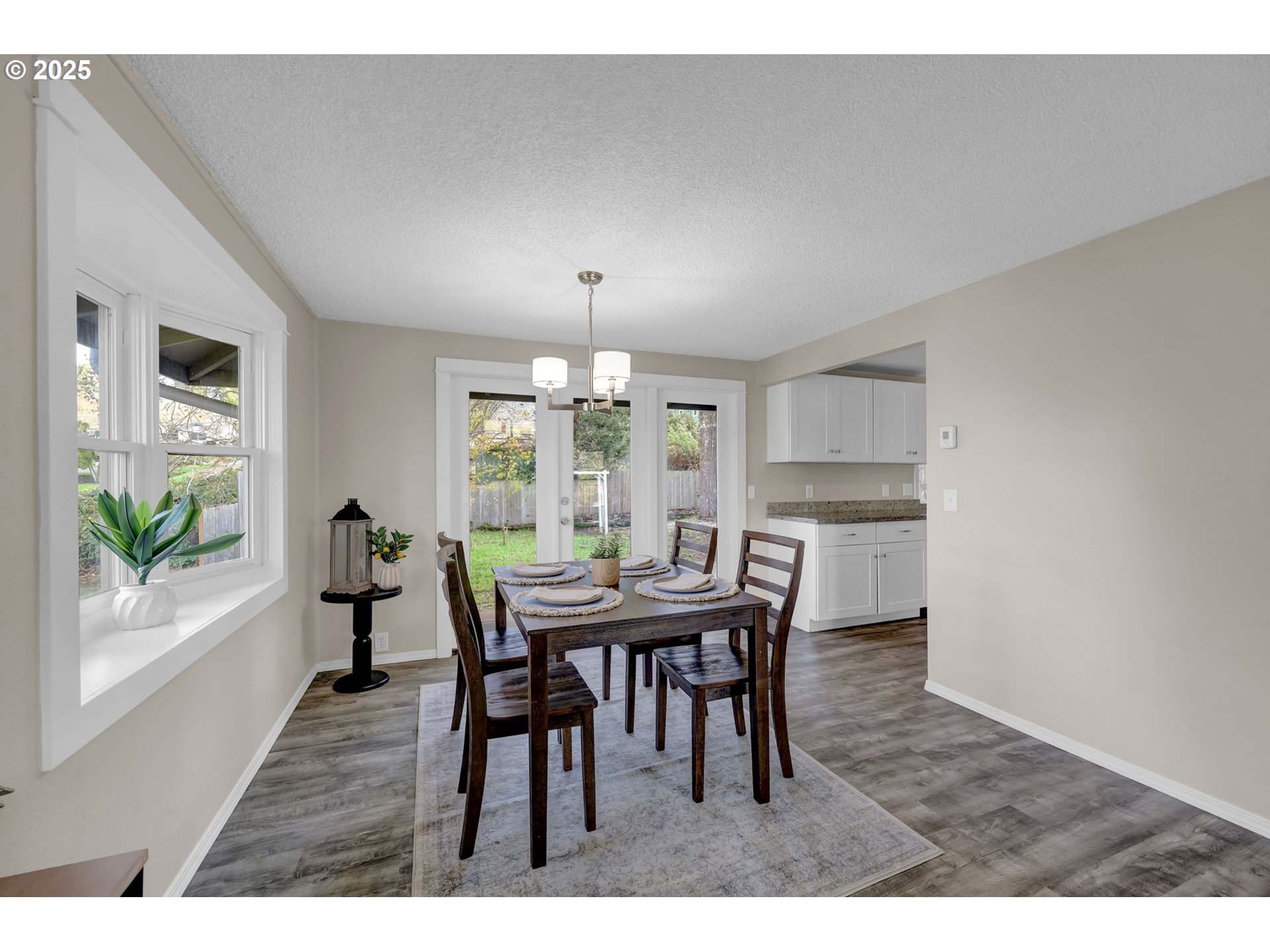 2015 Coventry Way Eugene, OR 97405 - Photo 13 of 48 a view of a dining room with furniture window and wooden floor