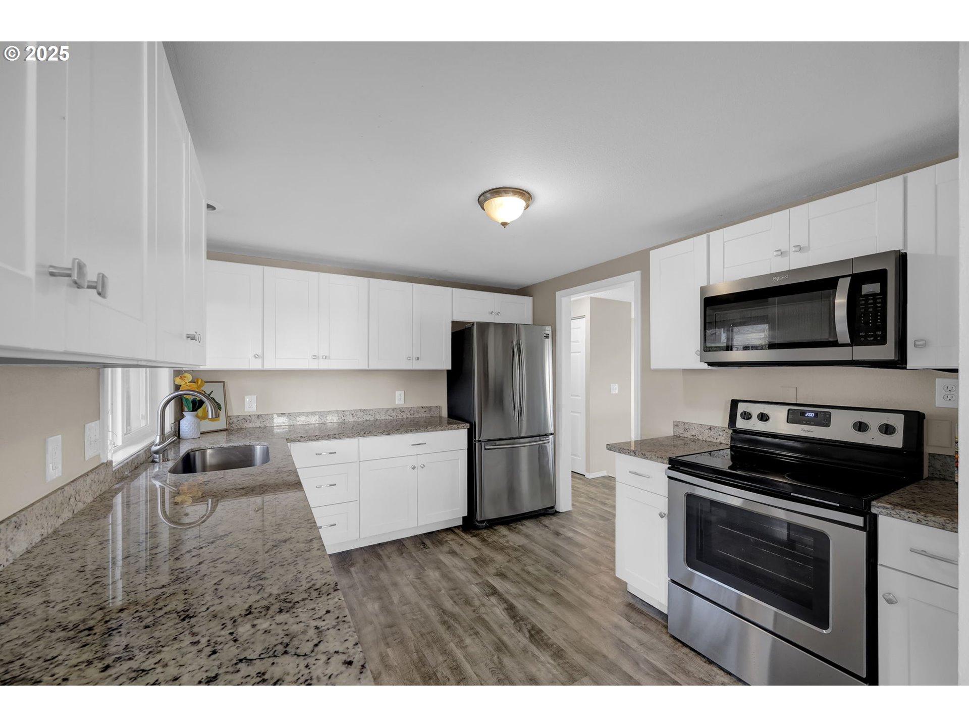 2015 Coventry Way Eugene, OR 97405 - Photo 15 of 48 a kitchen with a sink stainless steel appliances and cabinets