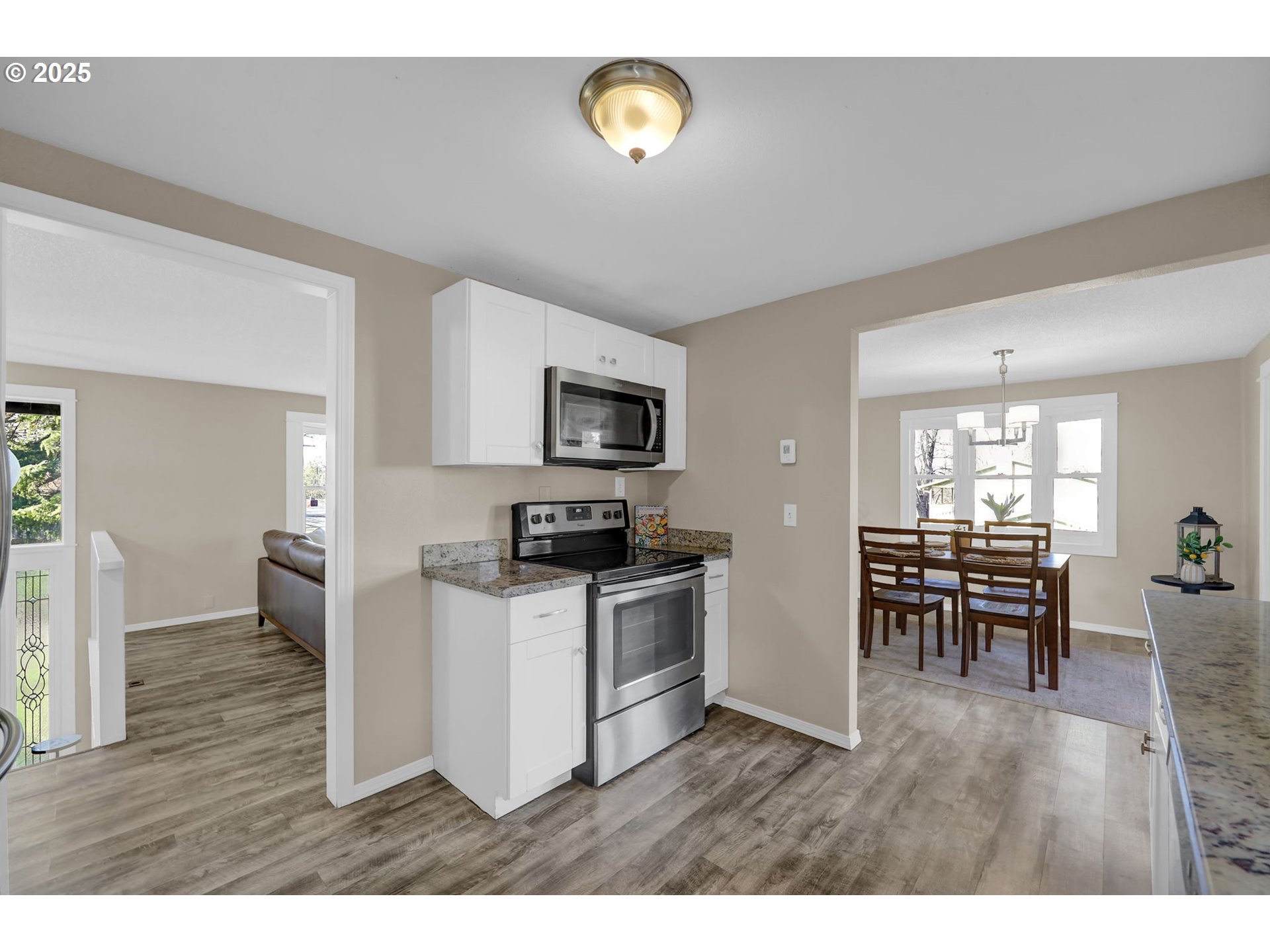 2015 Coventry Way Eugene, OR 97405 - Photo 17 of 48 a kitchen with furniture and a wooden floor