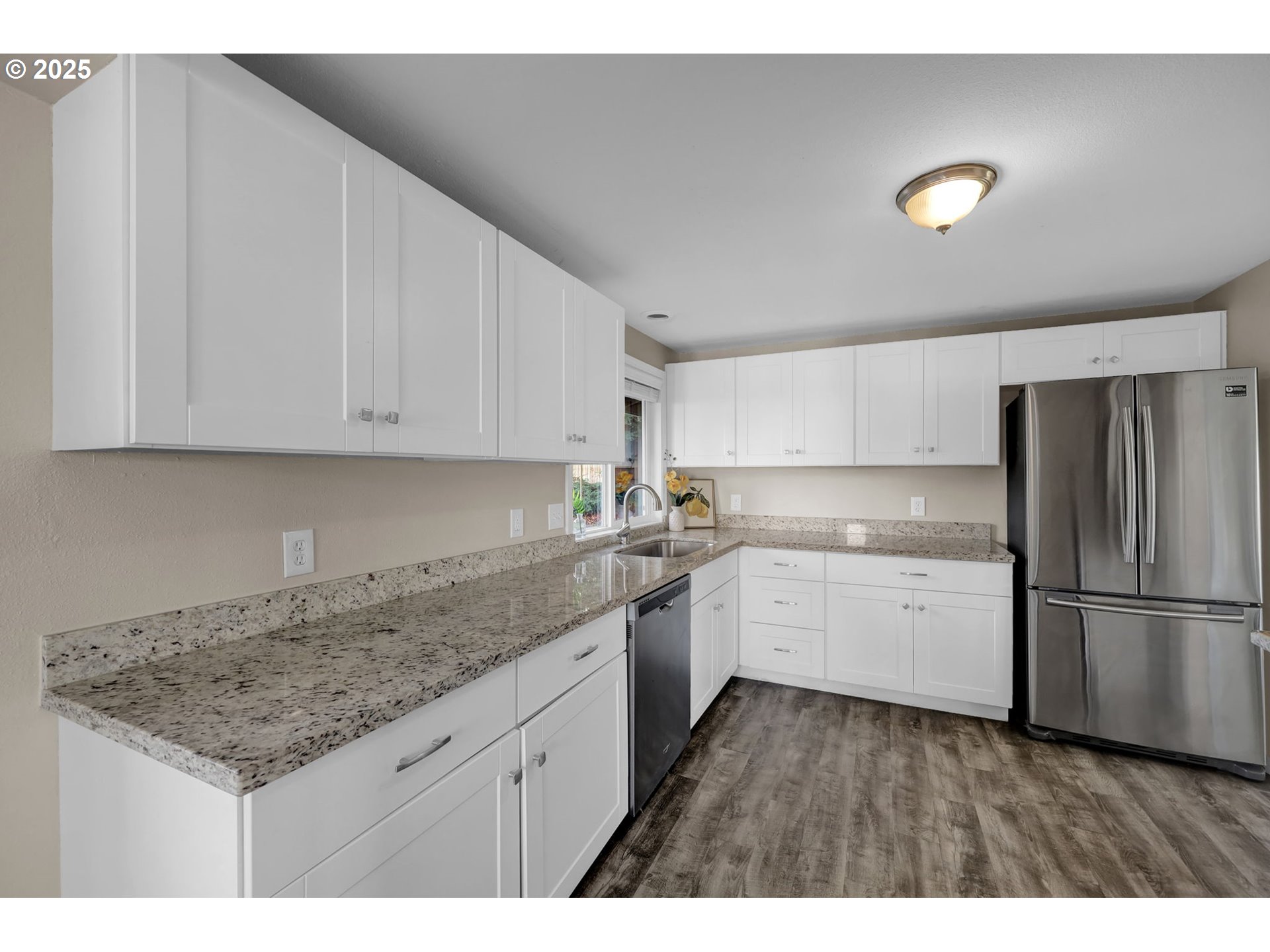 2015 Coventry Way Eugene, OR 97405 - Photo 18 of 48 a kitchen with a sink a refrigerator and cabinets