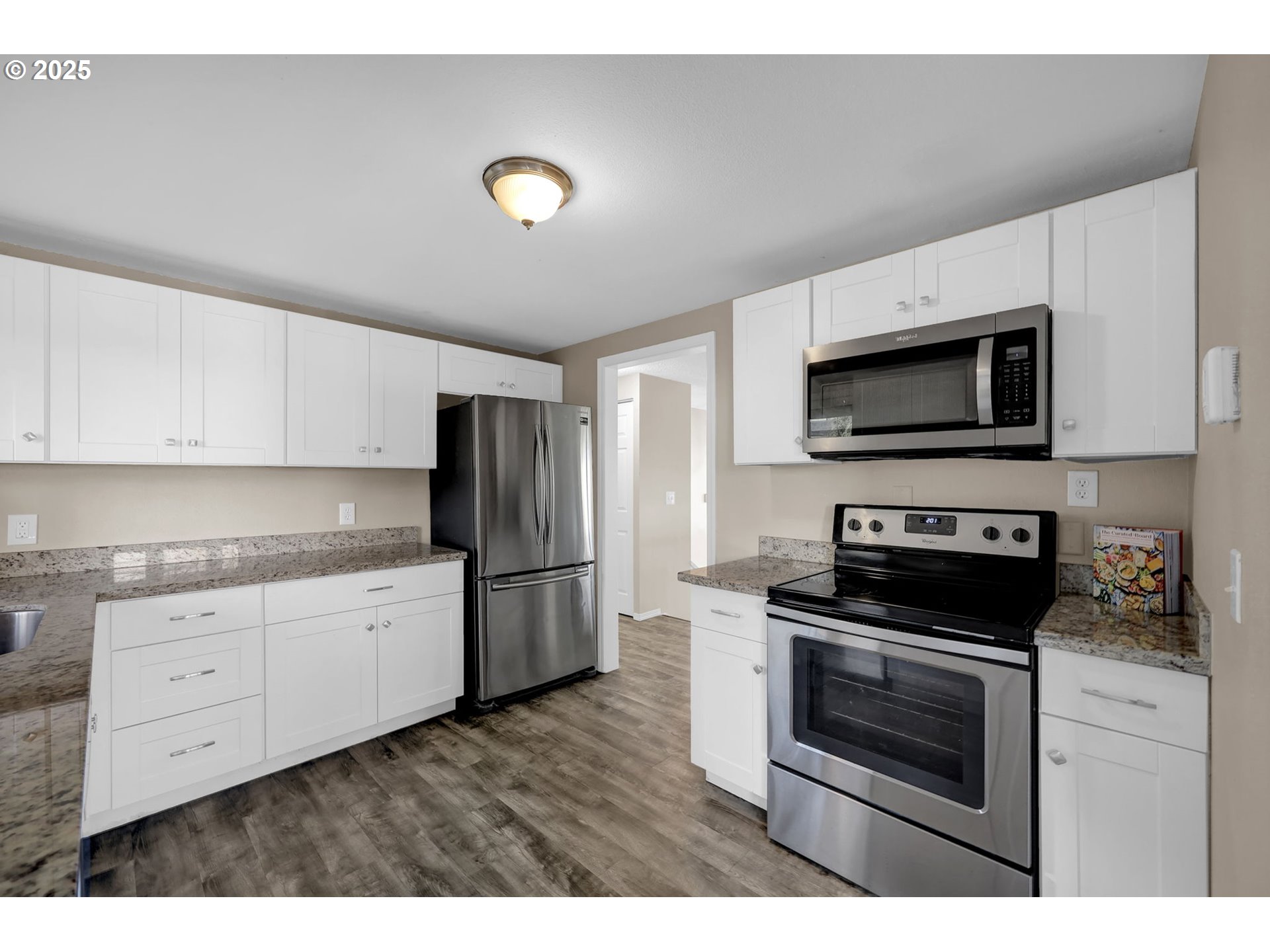 2015 Coventry Way Eugene, OR 97405 - Photo 19 of 48 a kitchen with appliances a sink and cabinets