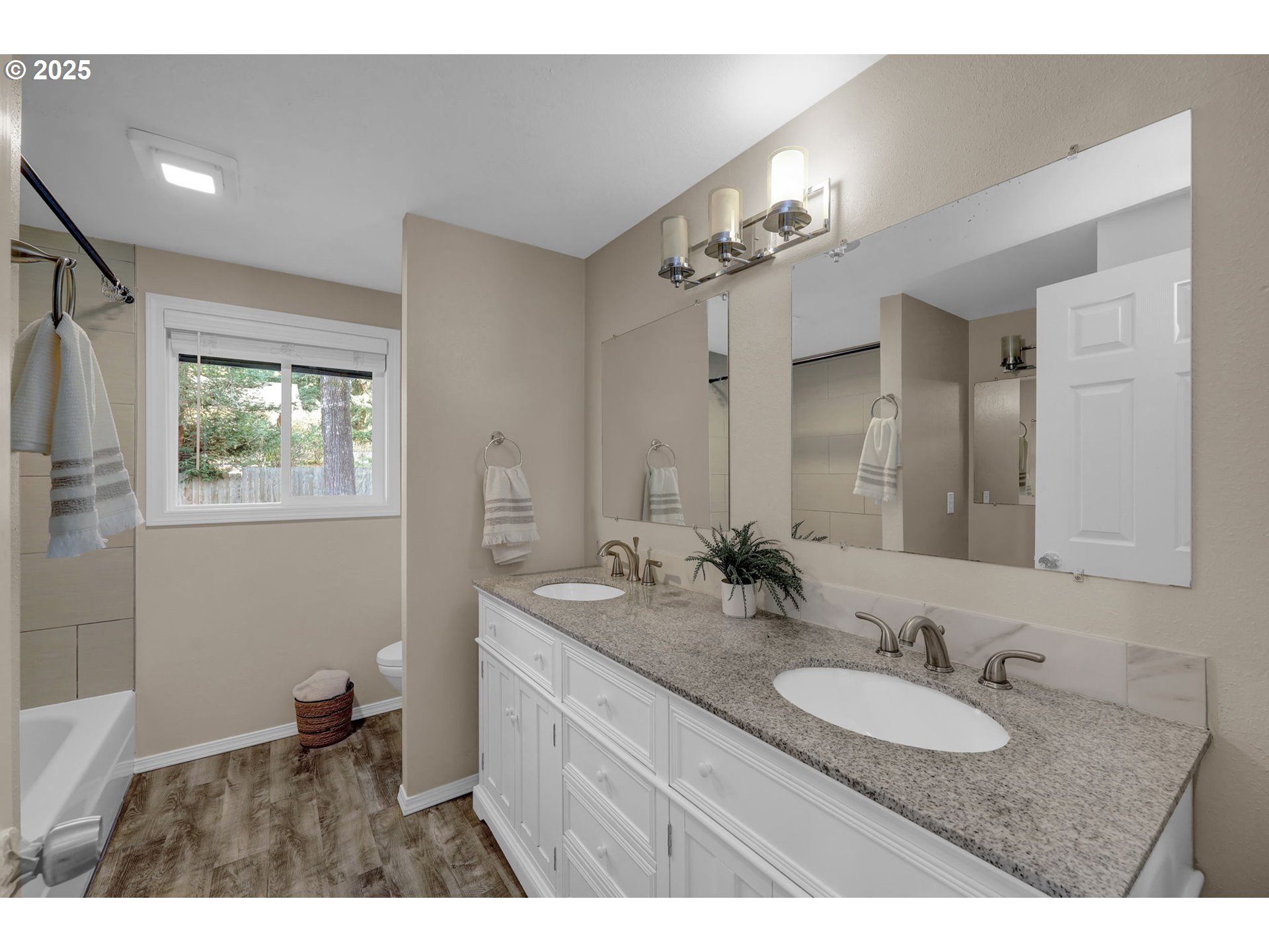 2015 Coventry Way Eugene, OR 97405 - Photo 20 of 48 a bathroom with a sink double vanity granite and a mirror