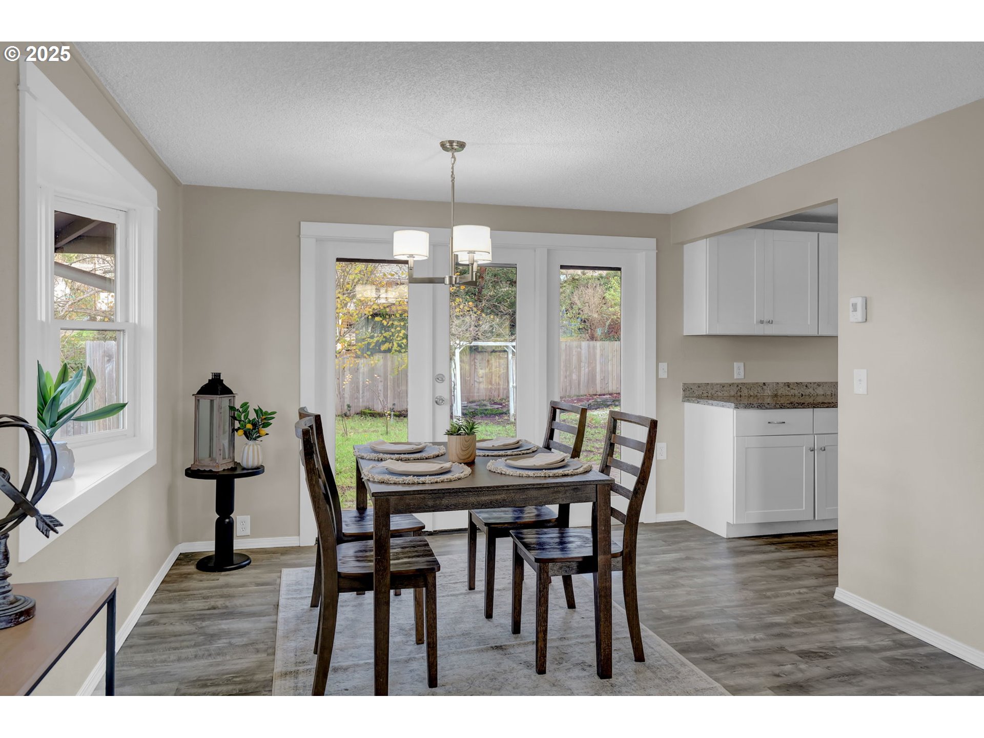 2015 Coventry Way Eugene, OR 97405 - Photo 41 of 48 a view of a dining room with furniture window and wooden floor