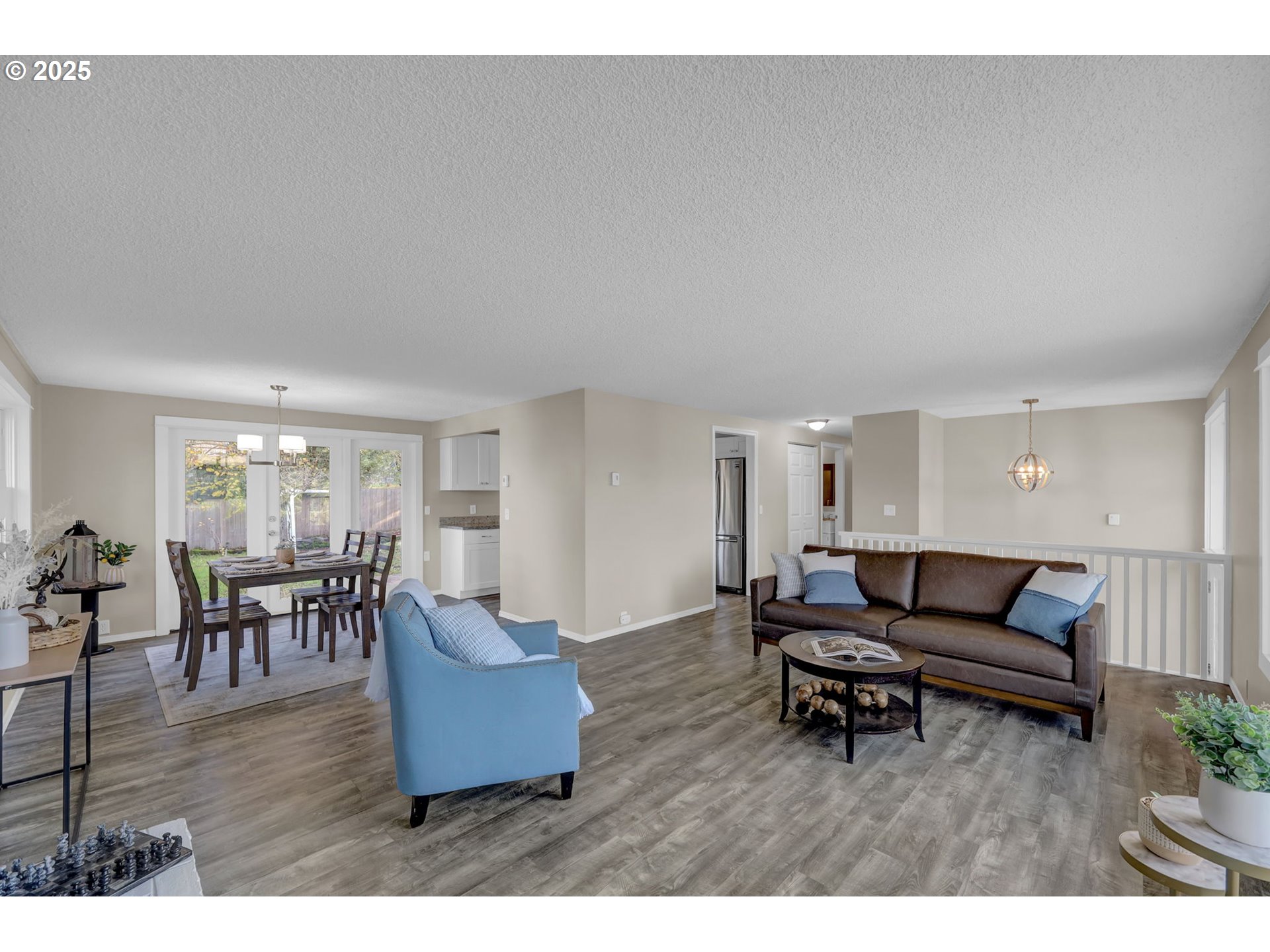 2015 Coventry Way Eugene, OR 97405 - Photo 9 of 48 a living room with furniture and a wooden floor