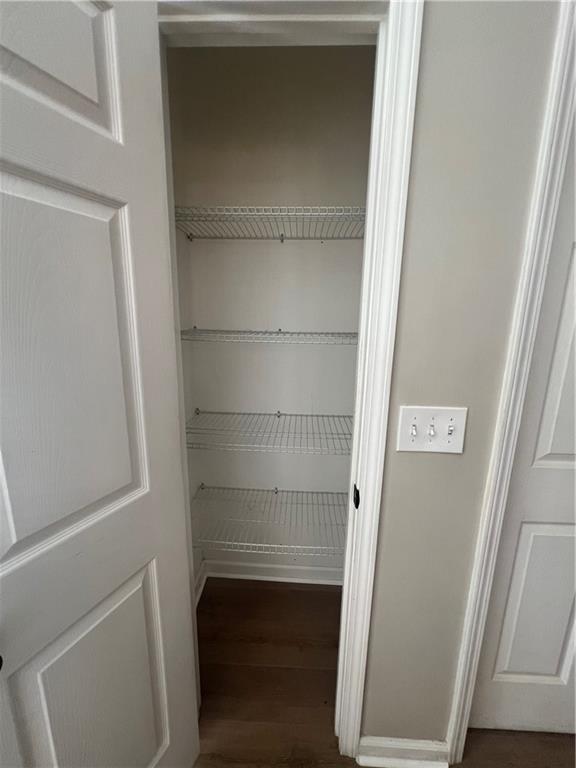 5455 Woodrun Lane Alpharetta, GA 30005 - Photo 18 of 71 a view of walk in closet