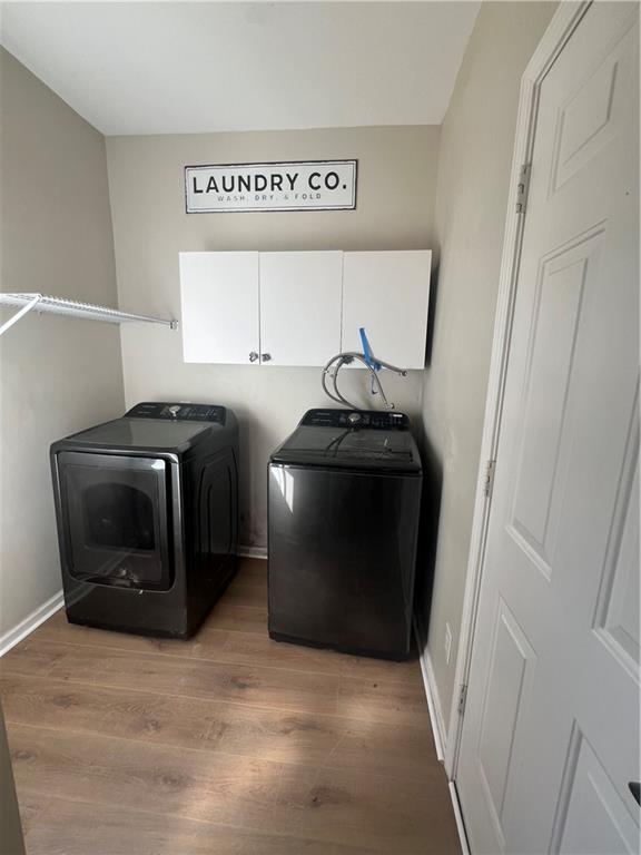 5455 Woodrun Lane Alpharetta, GA 30005 - Photo 19 of 71 a utility room with dryer and washer
