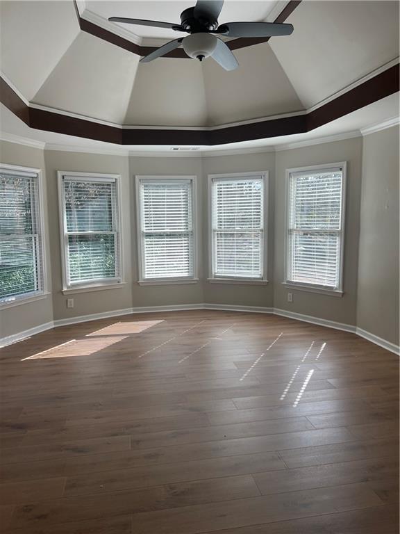 5455 Woodrun Lane Alpharetta, GA 30005 - Photo 28 of 71 a view of an empty room with a window and wooden floor
