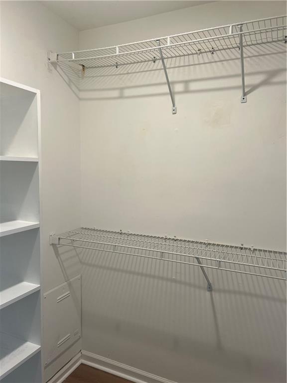 5455 Woodrun Lane Alpharetta, GA 30005 - Photo 30 of 71 a view of a room with racks on the wall