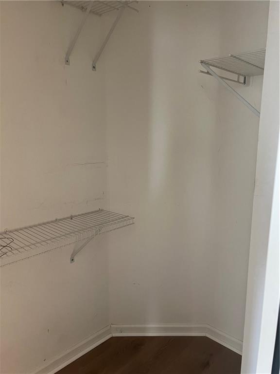 5455 Woodrun Lane Alpharetta, GA 30005 - Photo 32 of 71 a view of a room with racks on the wall