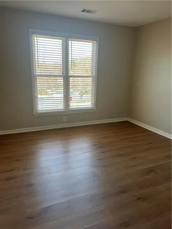 a view of a room with an empty space