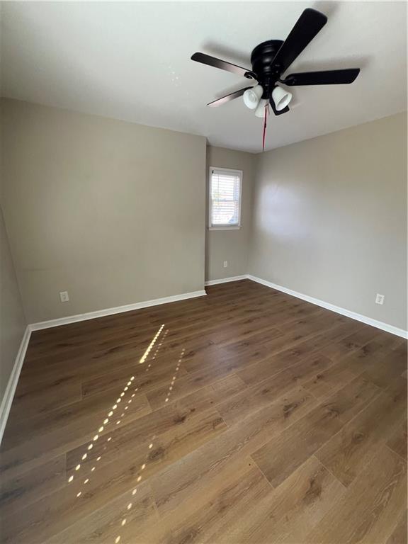 5455 Woodrun Lane Alpharetta, GA 30005 - Photo 57 of 71 a view of an empty room and window