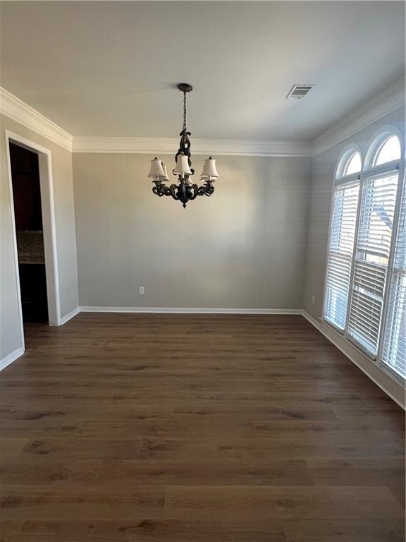 5455 Woodrun Lane Alpharetta, GA 30005 - Photo 8 of 71 a view of a room with wooden floor and window