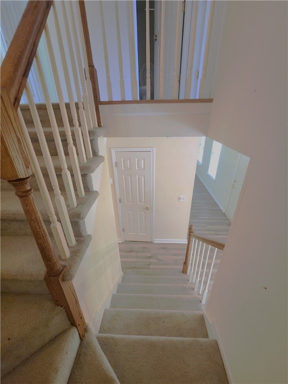 208 Blue Ridge Drive Clemson, SC 29631 - Photo 11 of 28 Staircase to main level