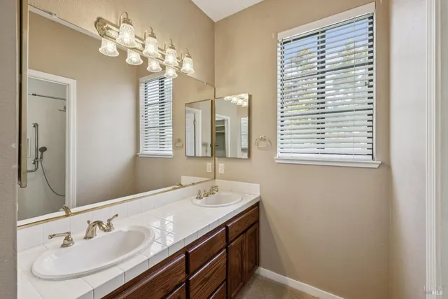 a bedroom with a bed and a night lamp