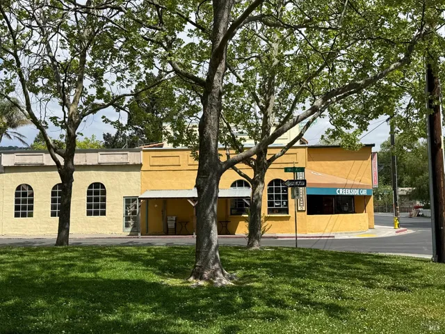 a building with trees in front of it