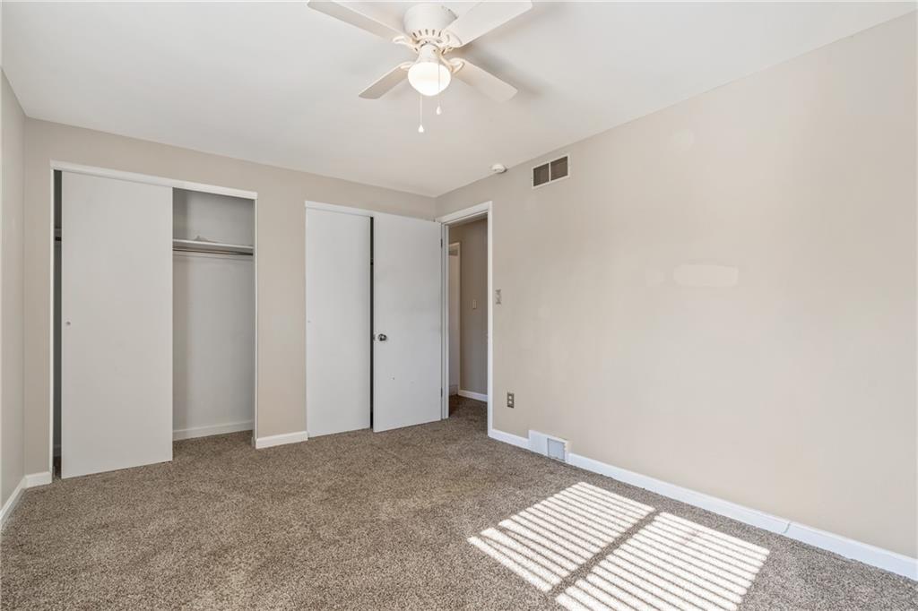 1015 1st Street McKees Rocks, PA 15136 - Photo 15 of 22 a view of an empty room with a ceiling fan
