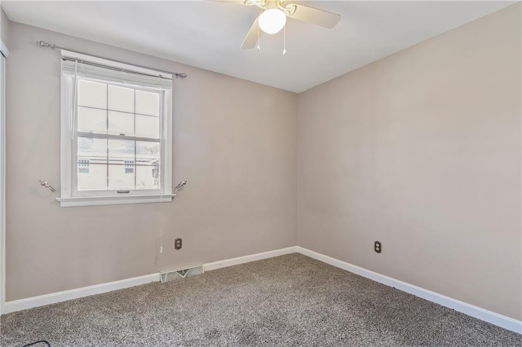 1015 1st Street McKees Rocks, PA 15136 - Photo 18 of 22 an empty room with a window