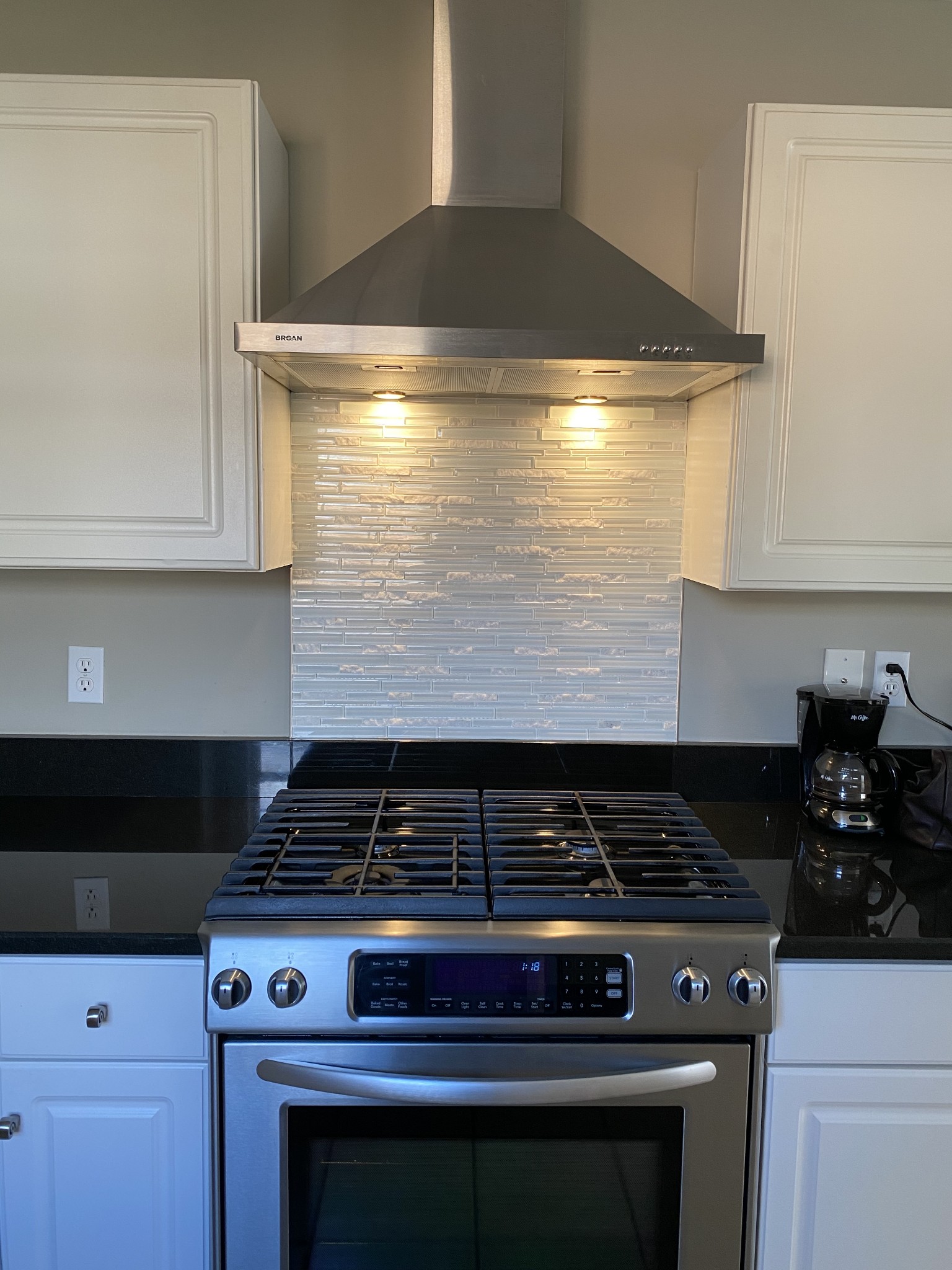 1045 Edgewater Circle Gallatin, TN 37066 - Photo 8 of 10 a stove top oven sitting inside of a kitchen