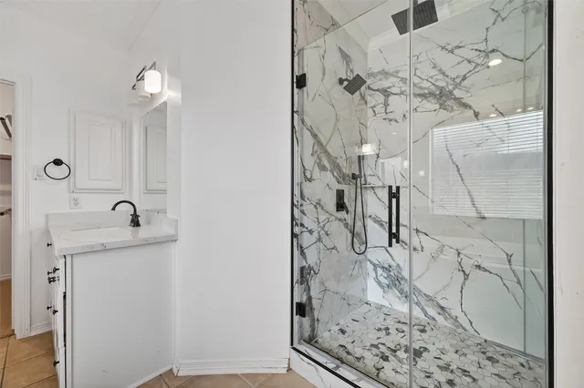 a bathroom with a sink and mirror