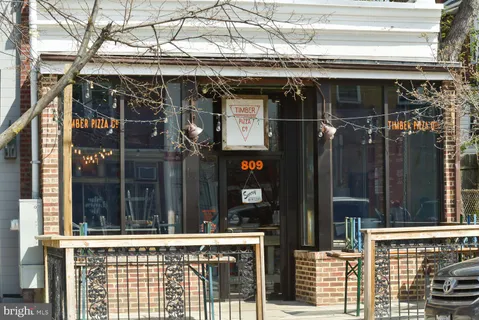 a front view of a building with street view