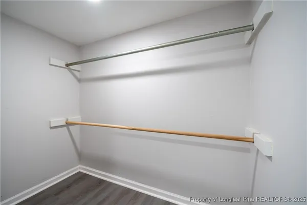 a view of an empty walk in closet