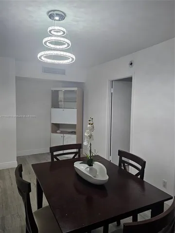 a view of a dining room with furniture