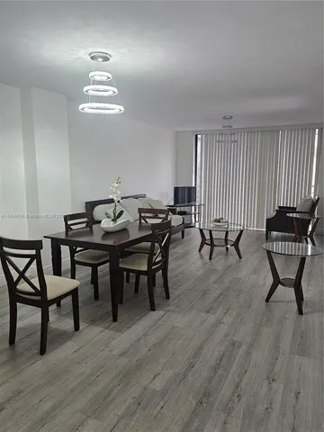 a view of a livingroom and dining room